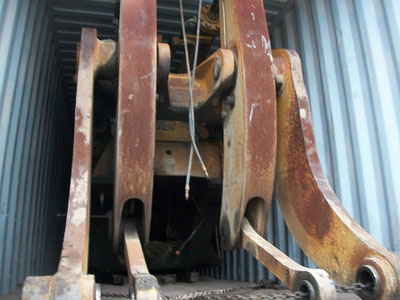 Export Logistics & Shipping, Inc. loads Kawasaki 115Z wheel loader into cube container for international transport